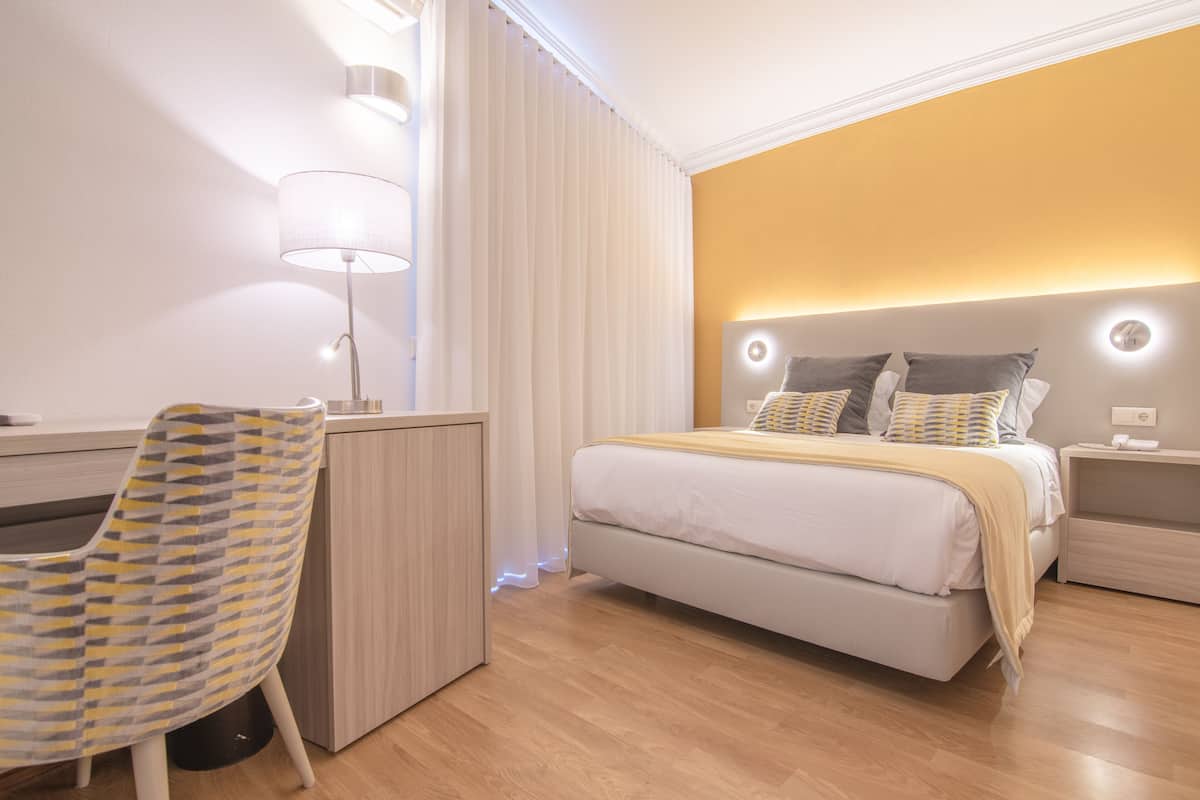 Habitación individual | Ropa de cama de alta calidad y minibar