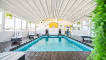 Outdoor pool, open 8 AM to 8 PM, pool loungers