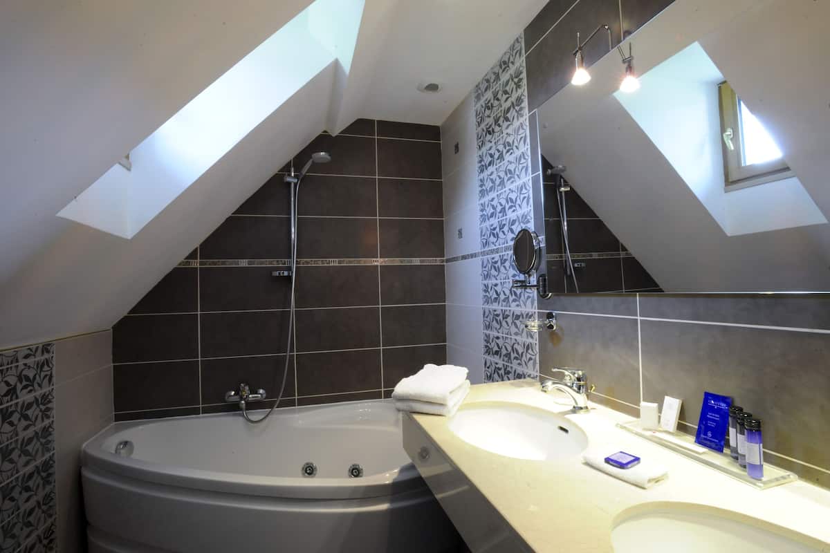 junior double suite | bathroom | designer toiletries, hair dryer, bathrobes, towels