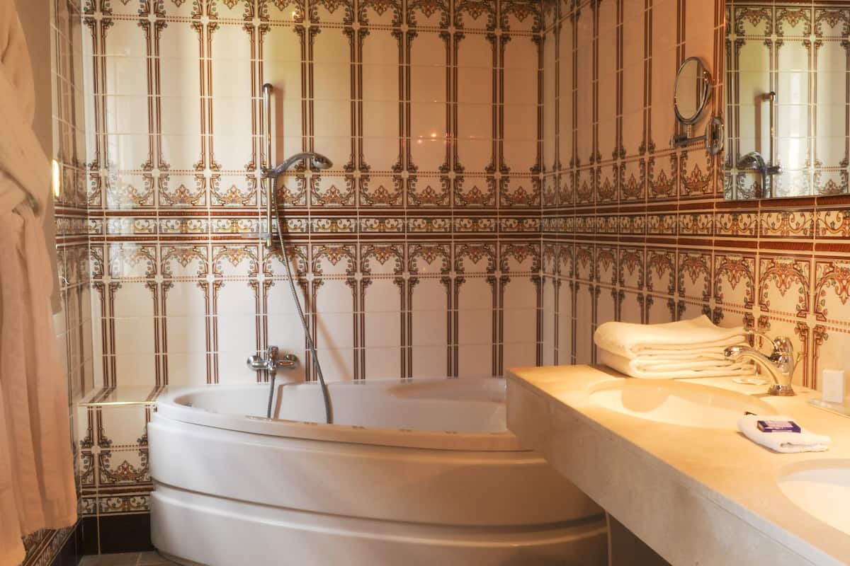 junior double suite | bathroom | designer toiletries, hair dryer, bathrobes, towels