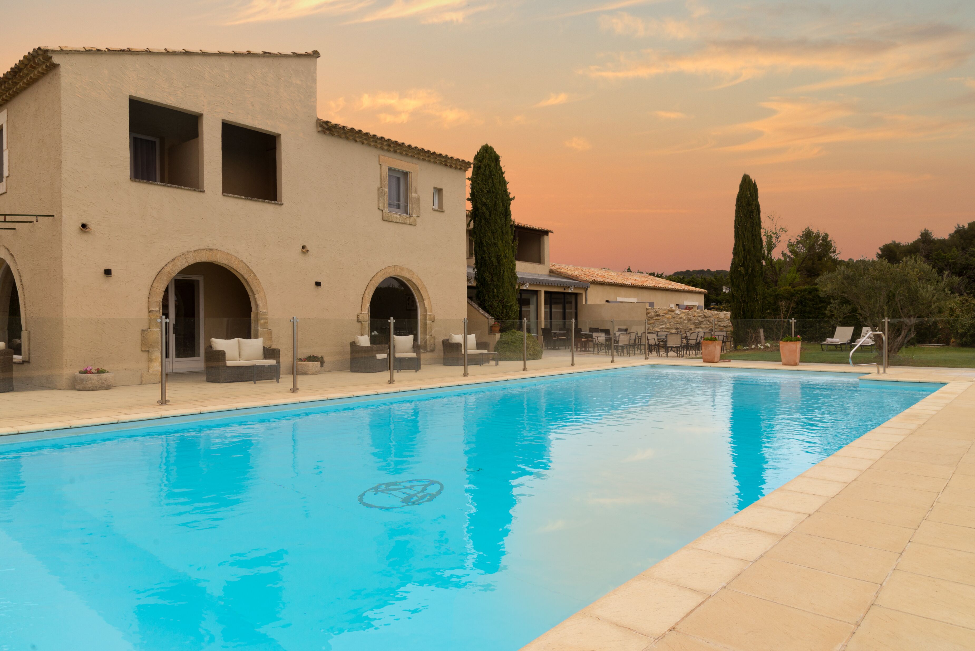 outdoor pool, open 8 am to 9 pm, pool umbrellas, pool loungers