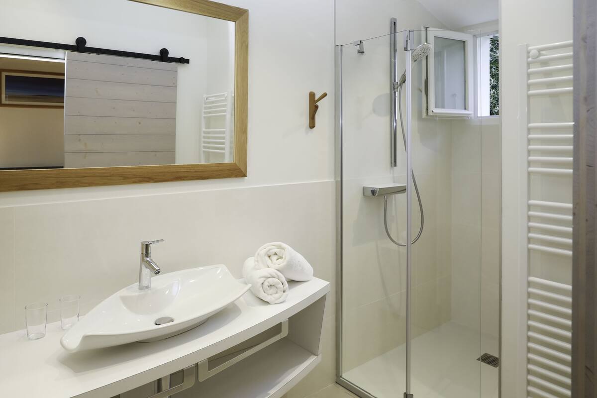 sea side suite  | bathroom | hair dryer, bathrobes, towels