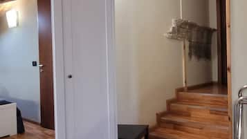 Family Quadruple Room | In-room safe, desk, laptop workspace, iron/ironing board