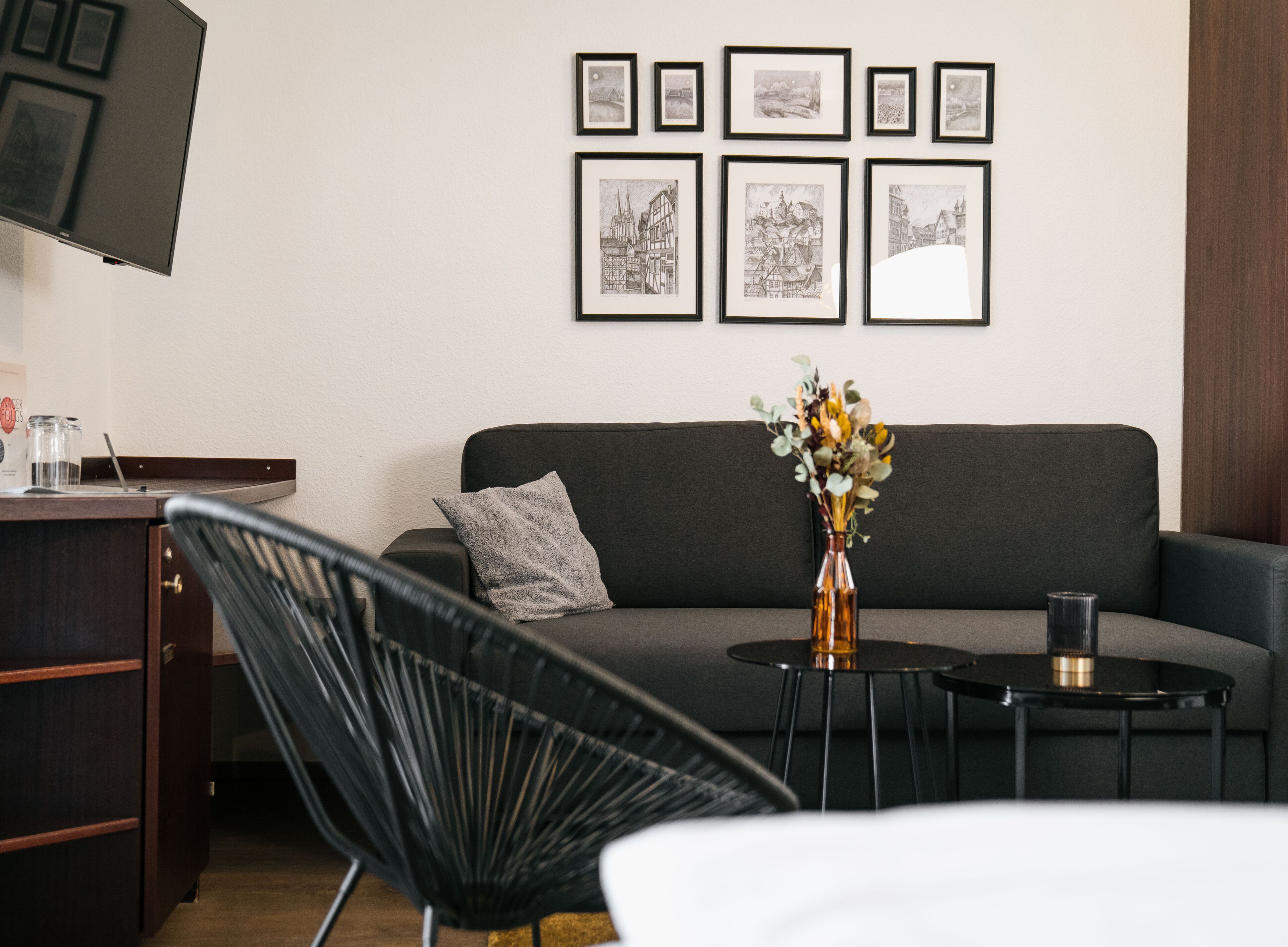 comfort double room (box spring bed 180x200) | living area | 24-inch tv with cable channels