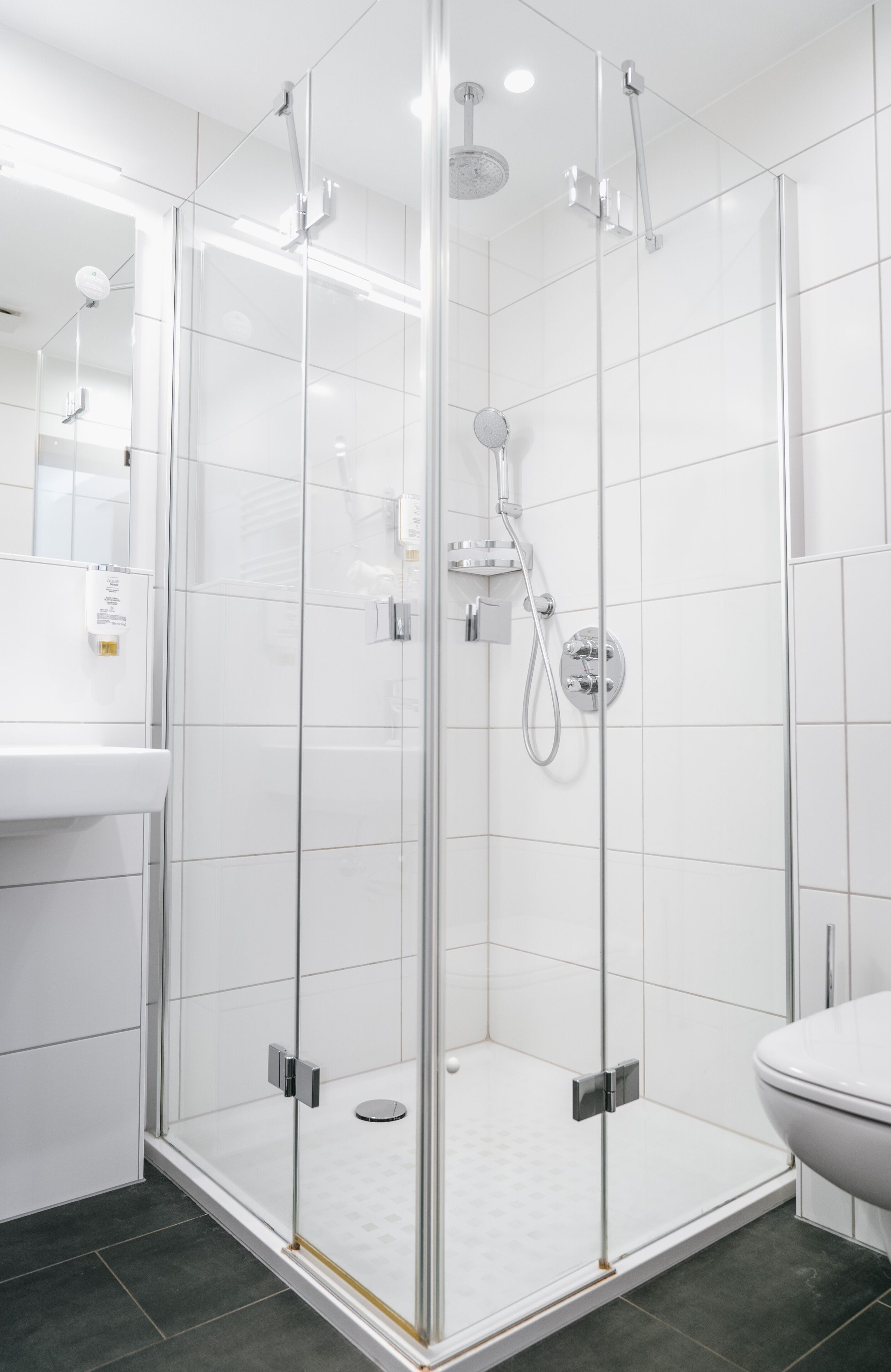 comfort double room (box spring bed 180x200) | bathroom | shower, rainfall showerhead, hair dryer, towels