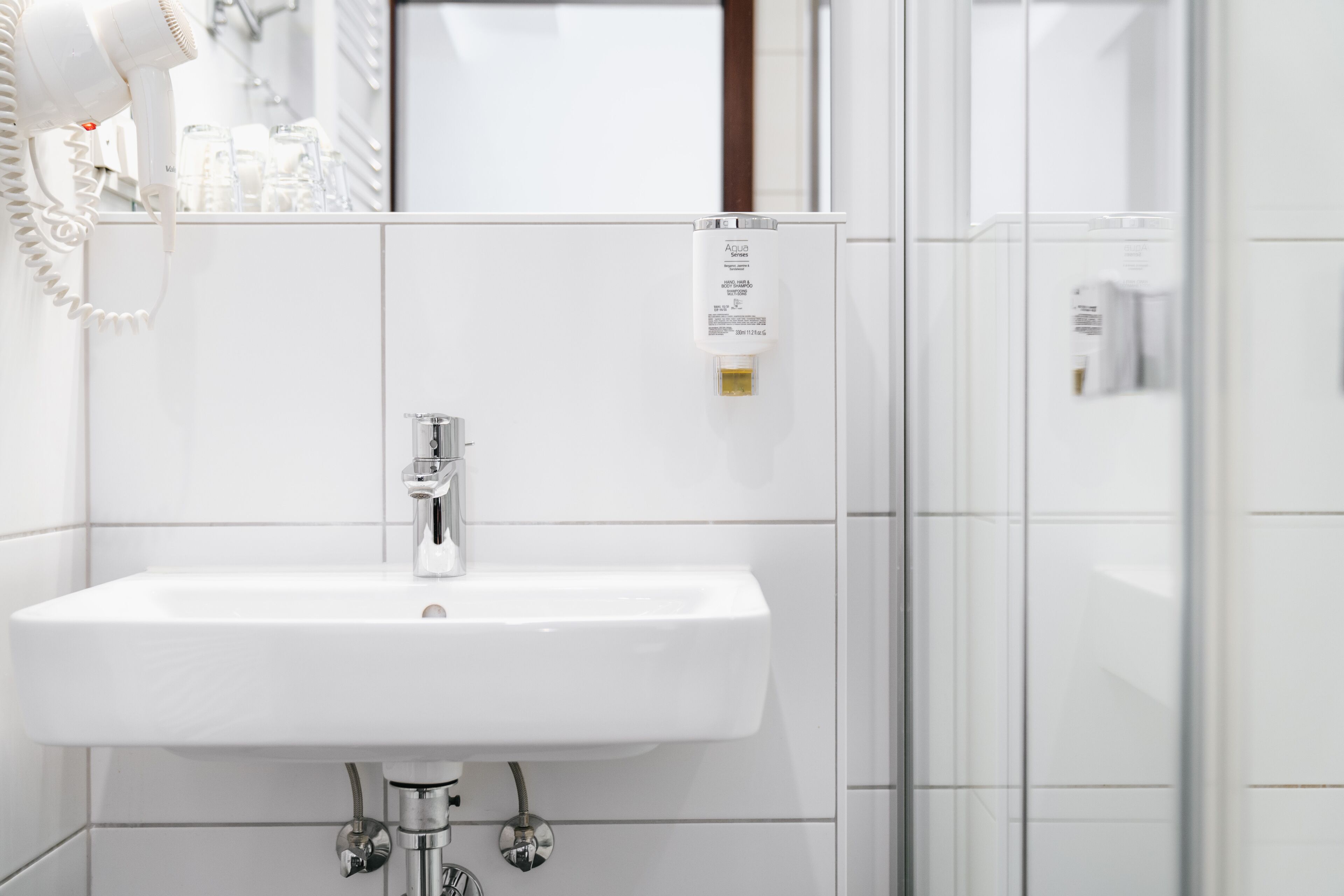 comfort double room (box spring bed 180x200) | bathroom | shower, rainfall showerhead, hair dryer, towels