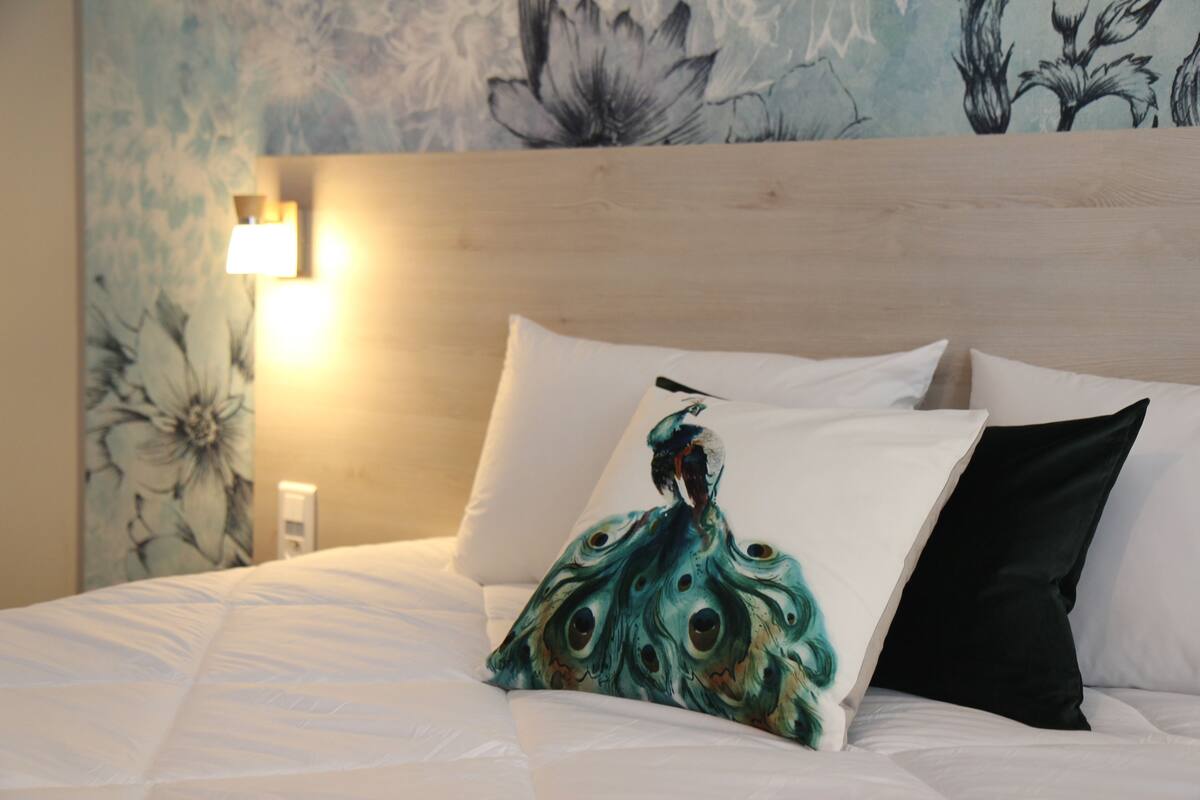 family room | desk, blackout curtains, soundproofing, iron/ironing board