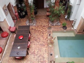 Breakfast, lunch, dinner served; Moroccan cuisine, pool views