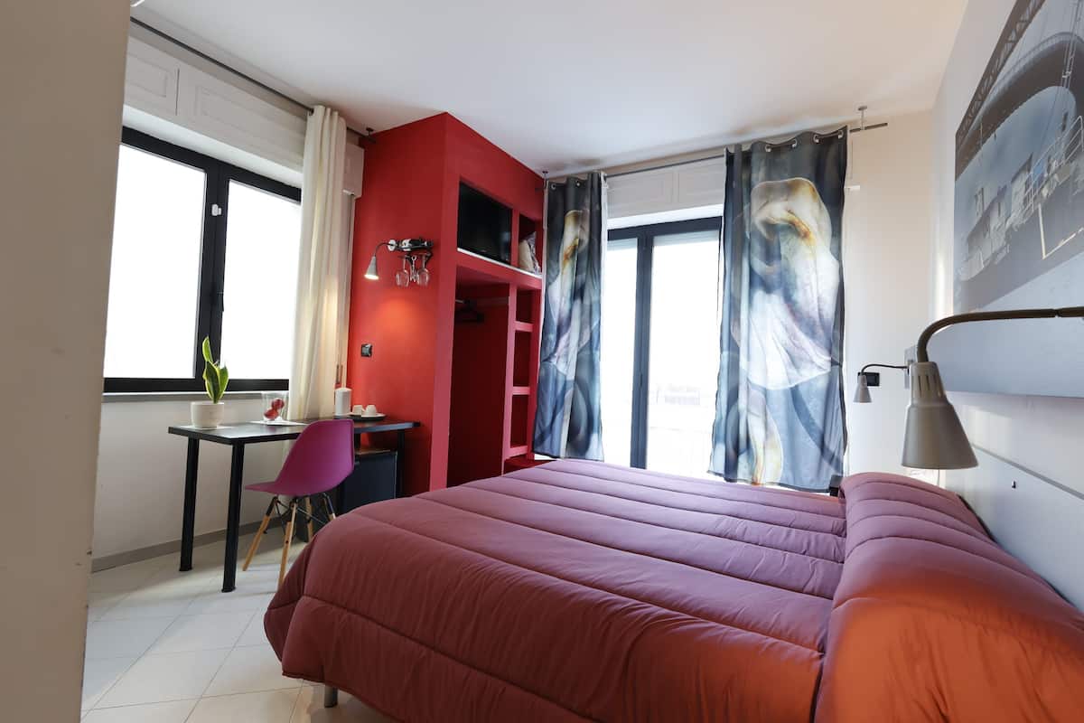 Standaard kamer | Een minibar, een kluis op de kamer, individueel gedecoreerd