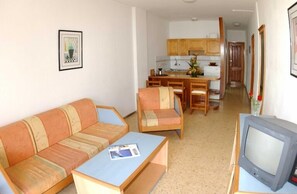 Full-size fridge, stovetop, coffee/tea maker