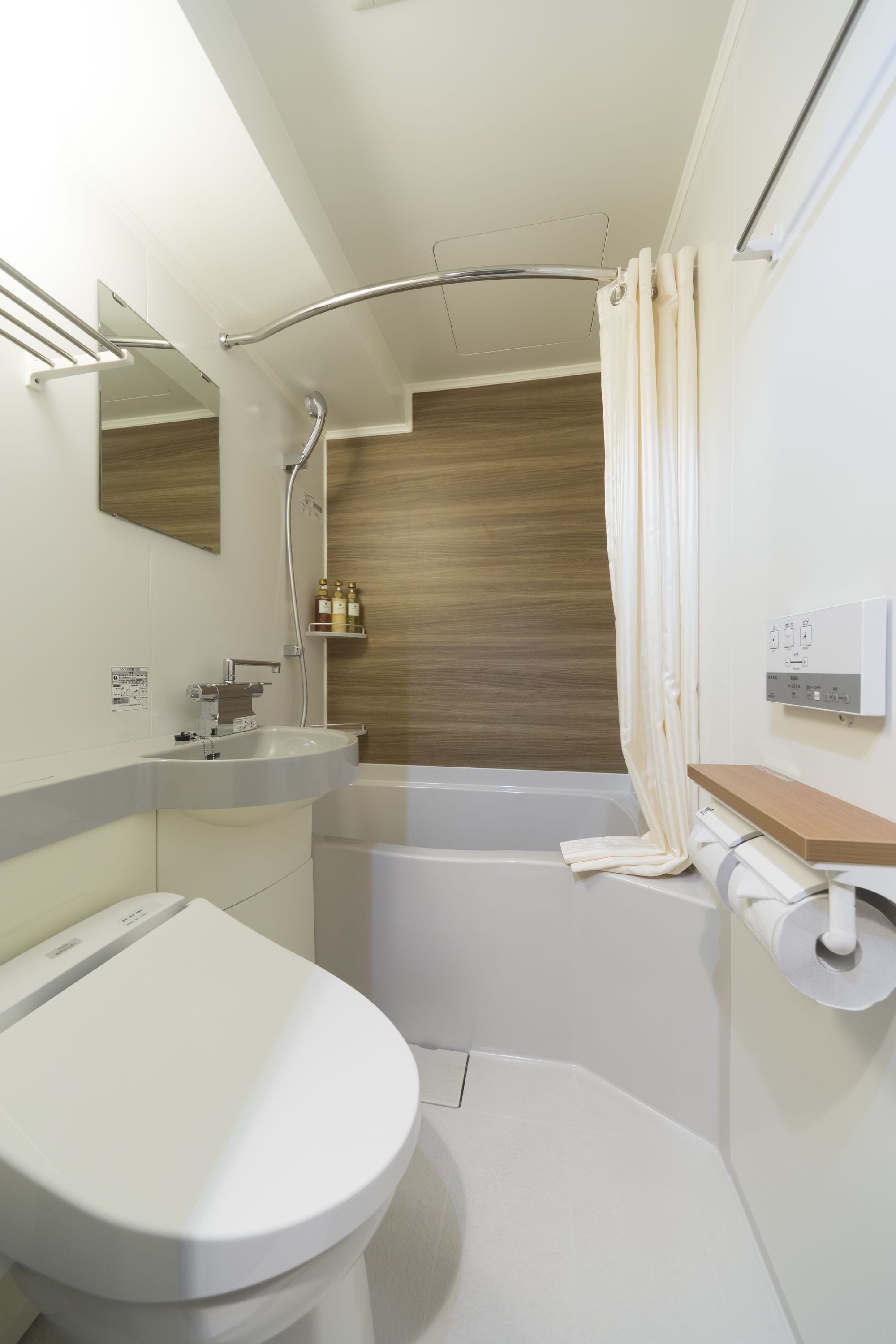 shower, hair dryer, slippers, bidet