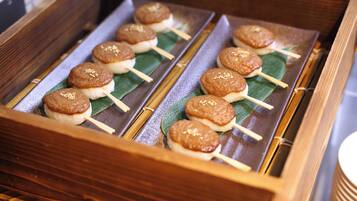 A wooden box containing food items.