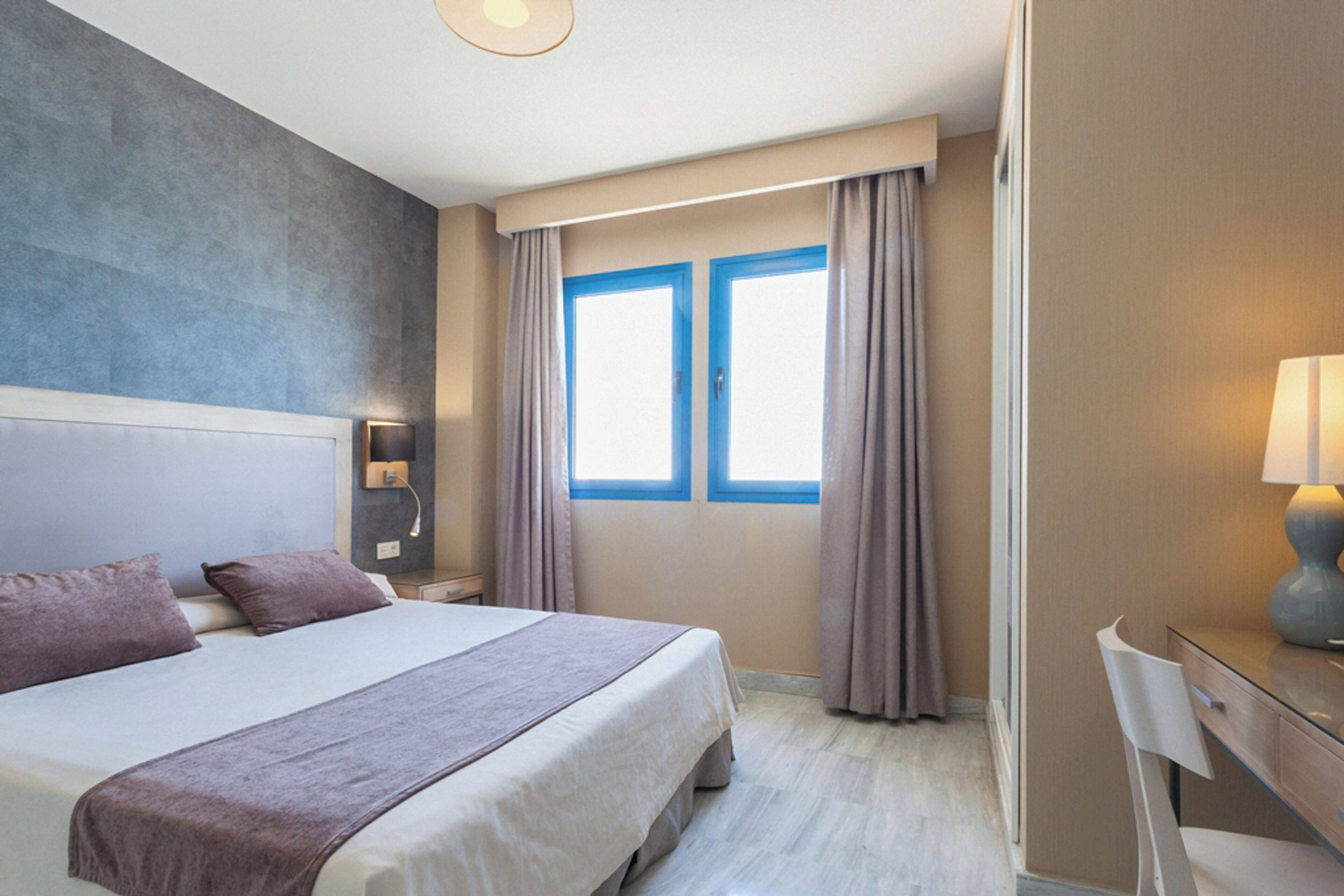 Desk, laptop workspace, blackout curtains, soundproofing