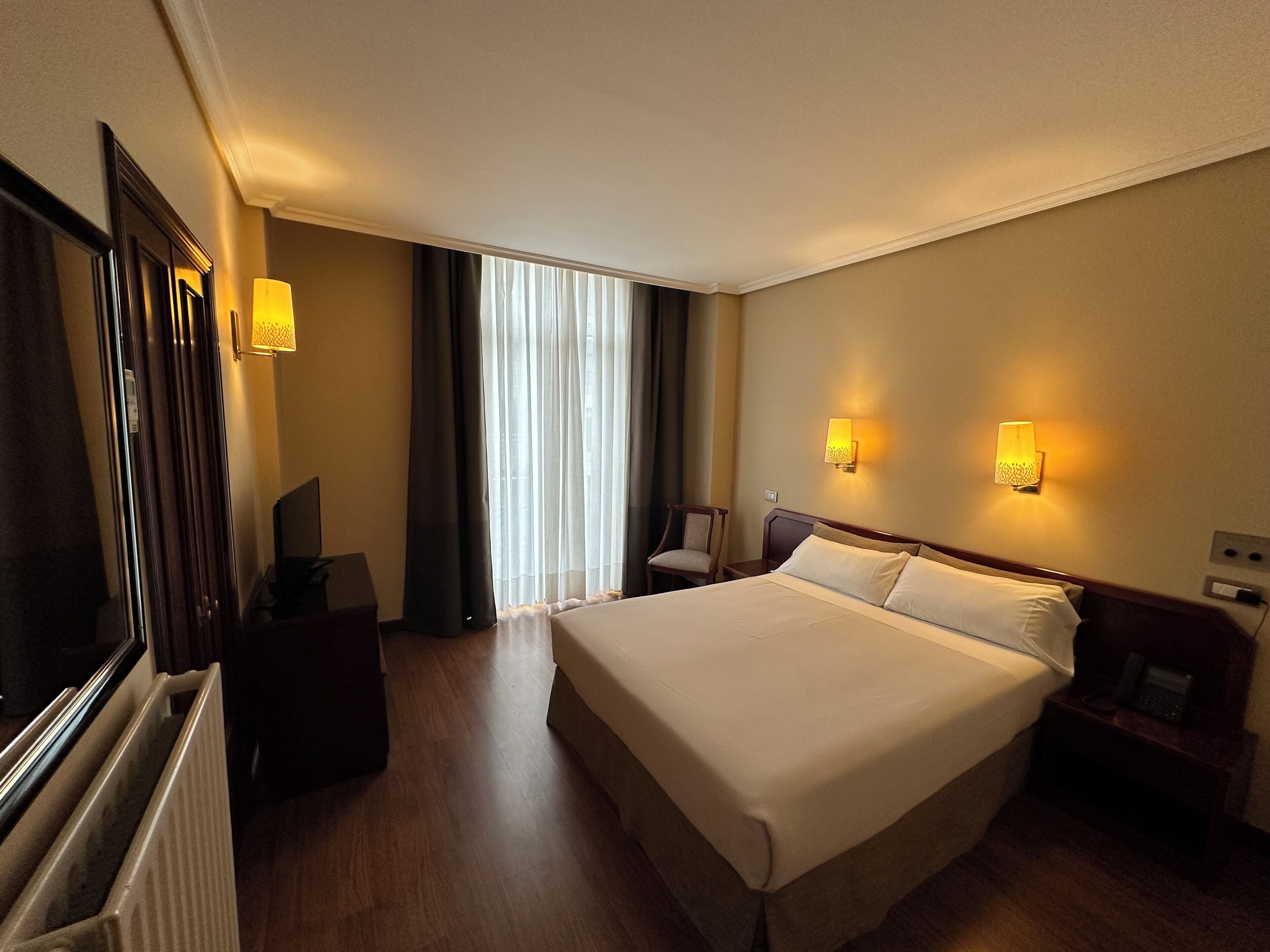 Desk, blackout curtains, free WiFi, bed sheets
