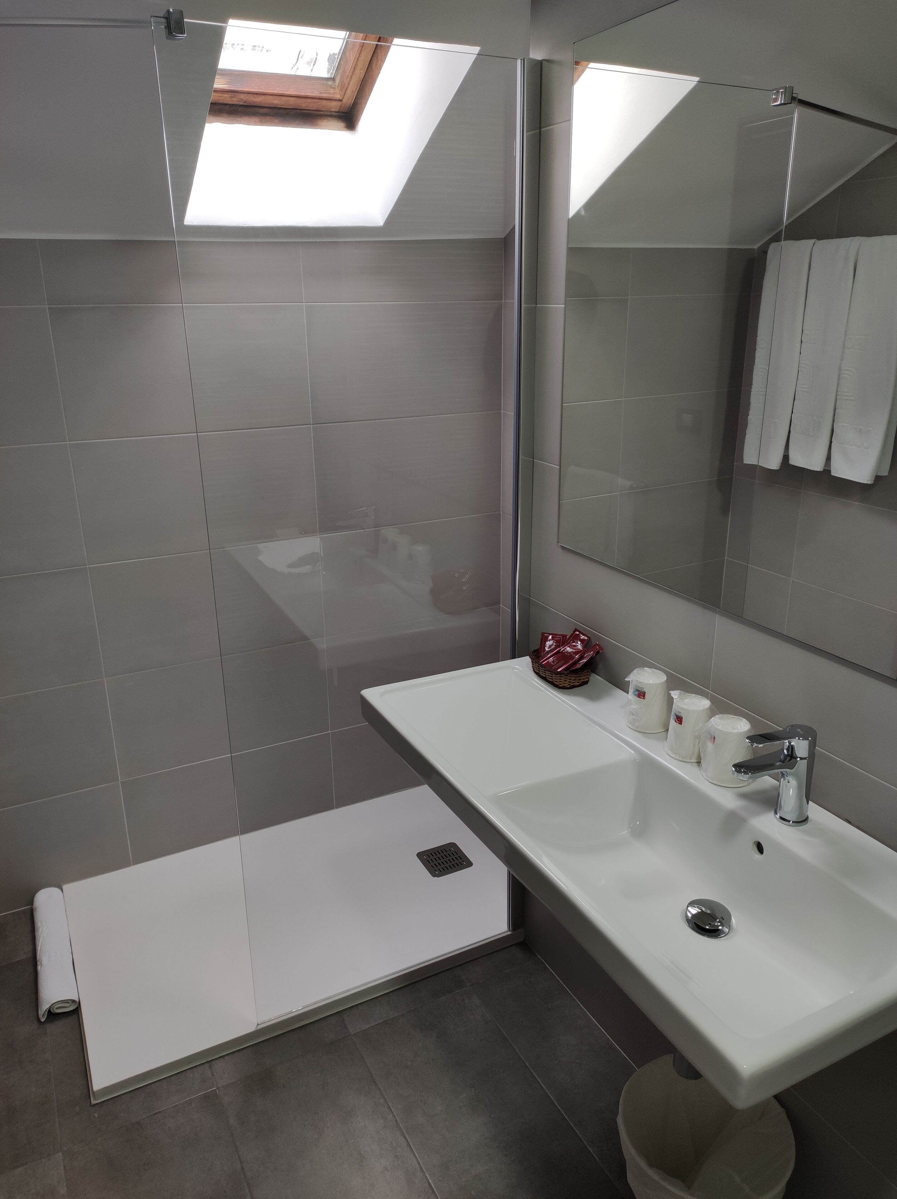 standard triple room | bathroom | shower, hair dryer, towels, soap