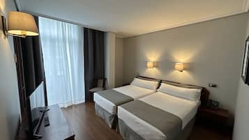 Desk, blackout curtains, free WiFi, bed sheets