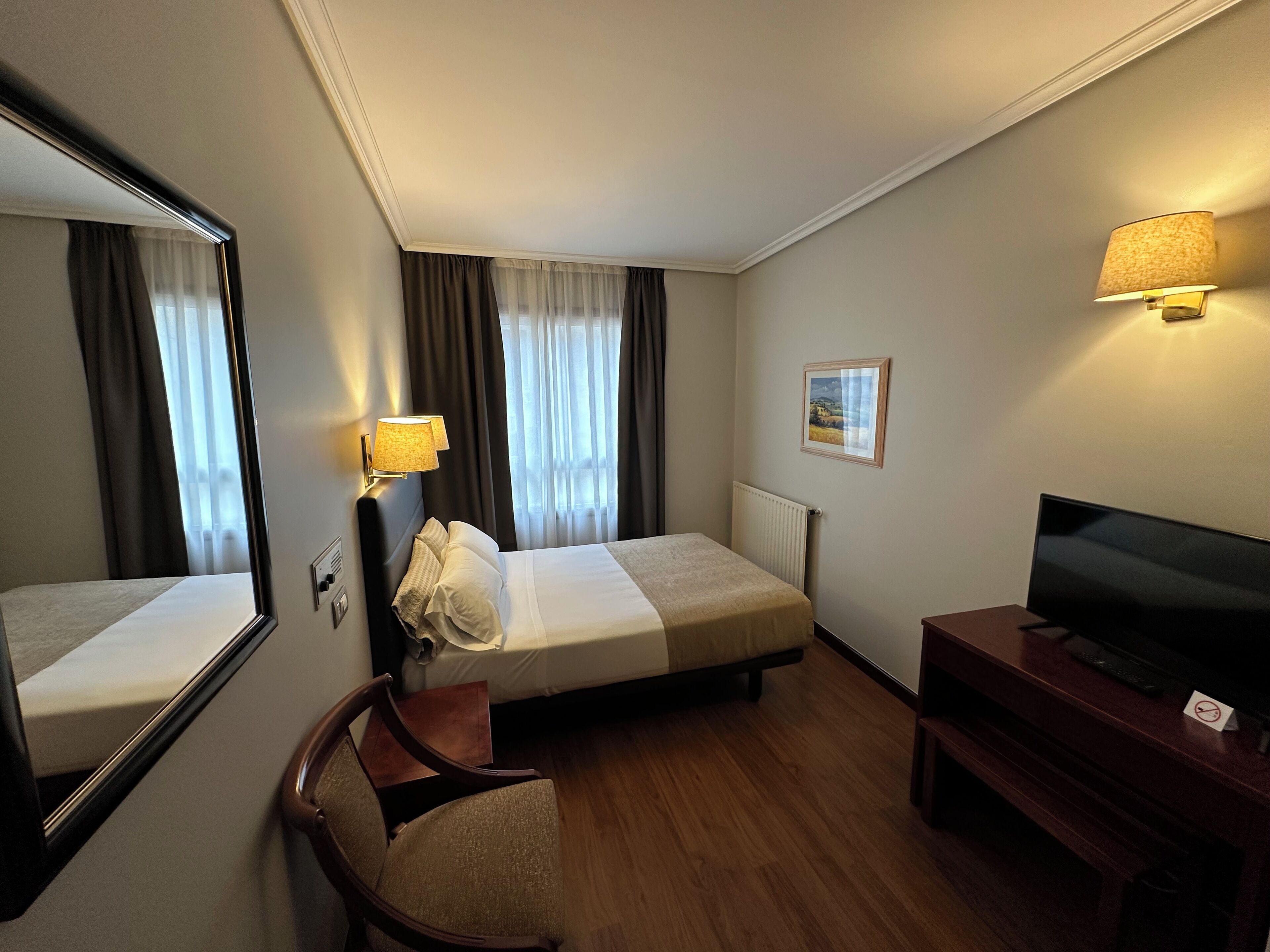Desk, blackout curtains, free WiFi, bed sheets