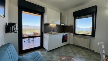 Appartement Standard, 1 chambre, terrasse, vue lac | Coin séjour