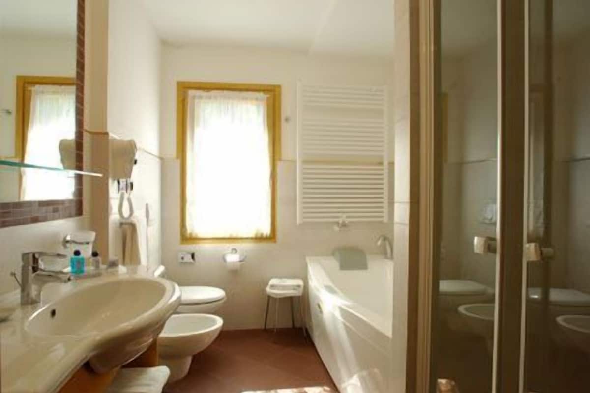 shower, free toiletries, hair dryer, bathrobes