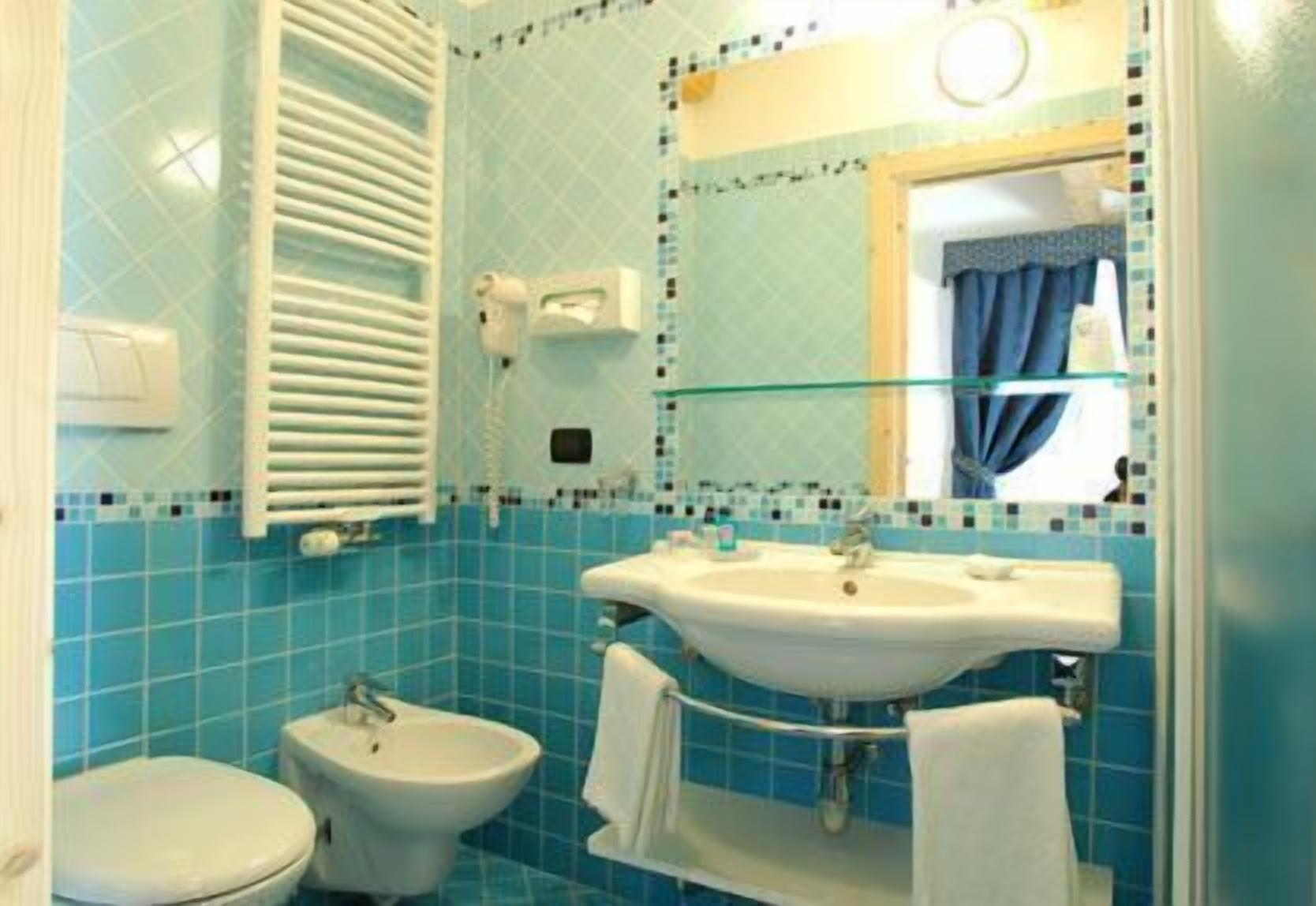 shower, free toiletries, hair dryer, bathrobes