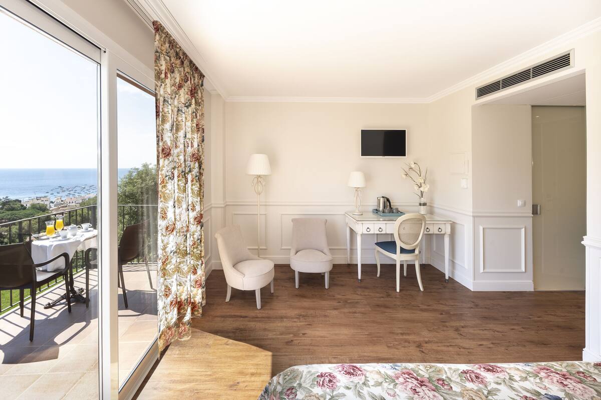 premium room, terrace, ocean view | minibar, in-room safe, desk, blackout curtains