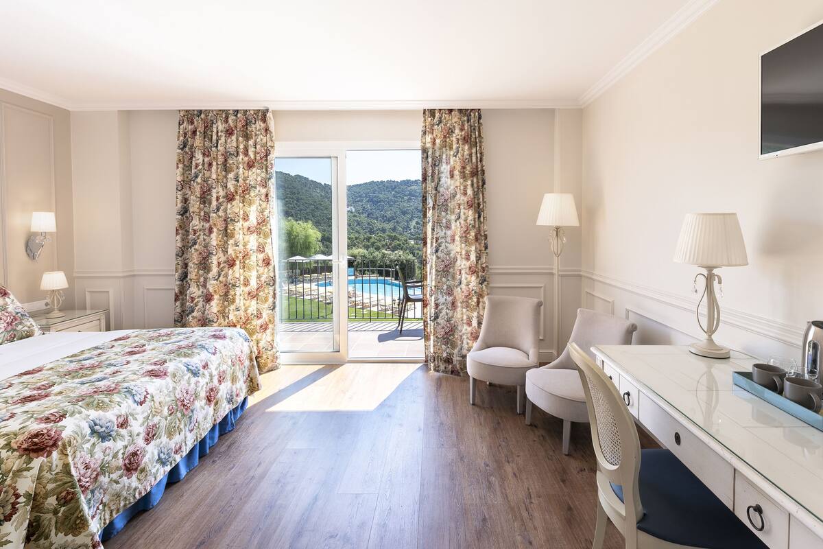 premium room, terrace, ocean view | minibar, in-room safe, desk, blackout curtains