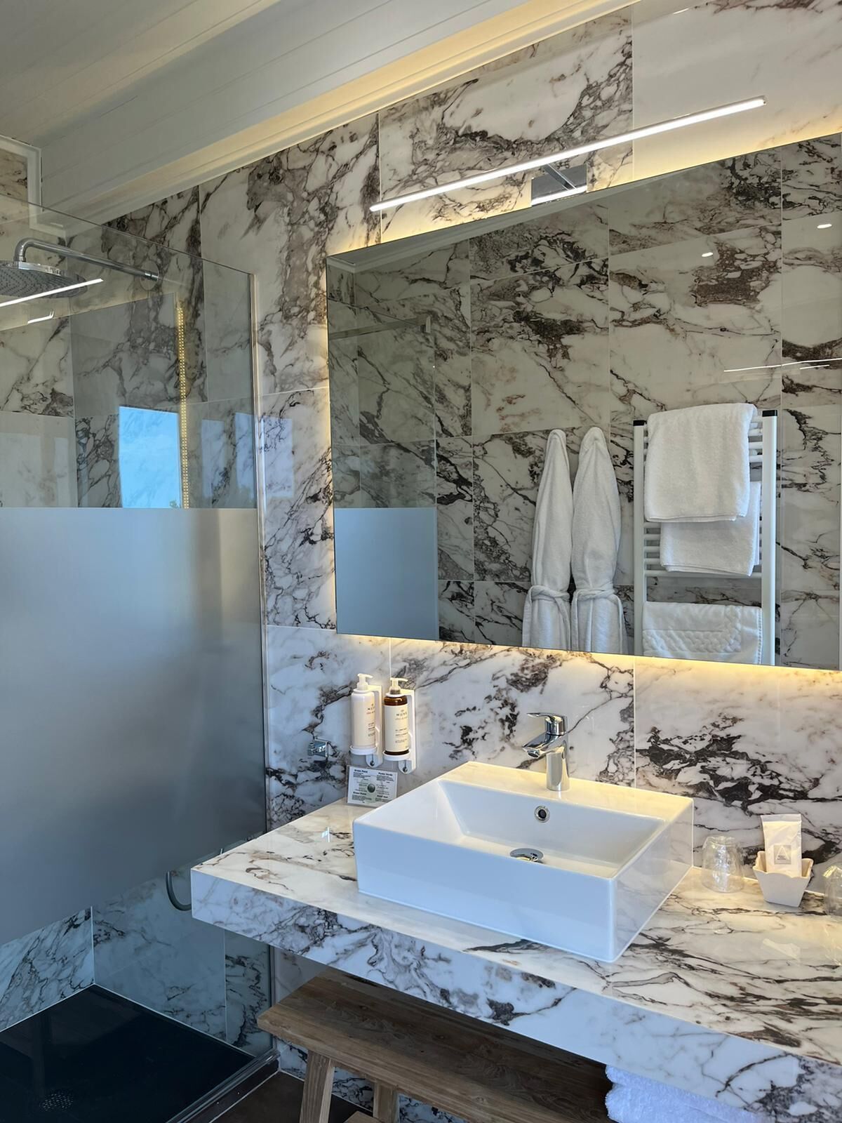 junior suite, terrace, ocean view | minibar, in-room safe, desk, blackout curtains