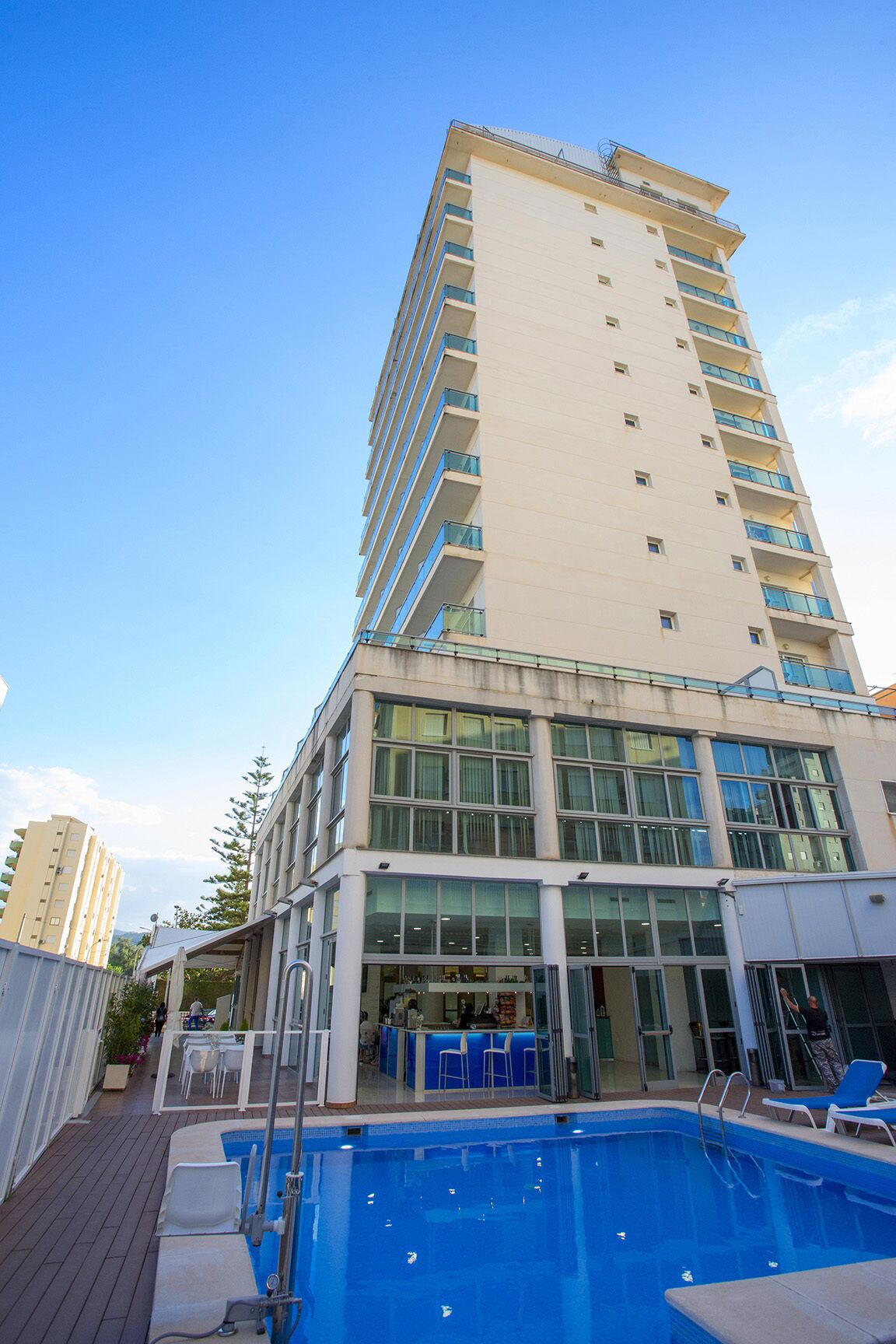 Outdoor pool, pool umbrellas, sun loungers