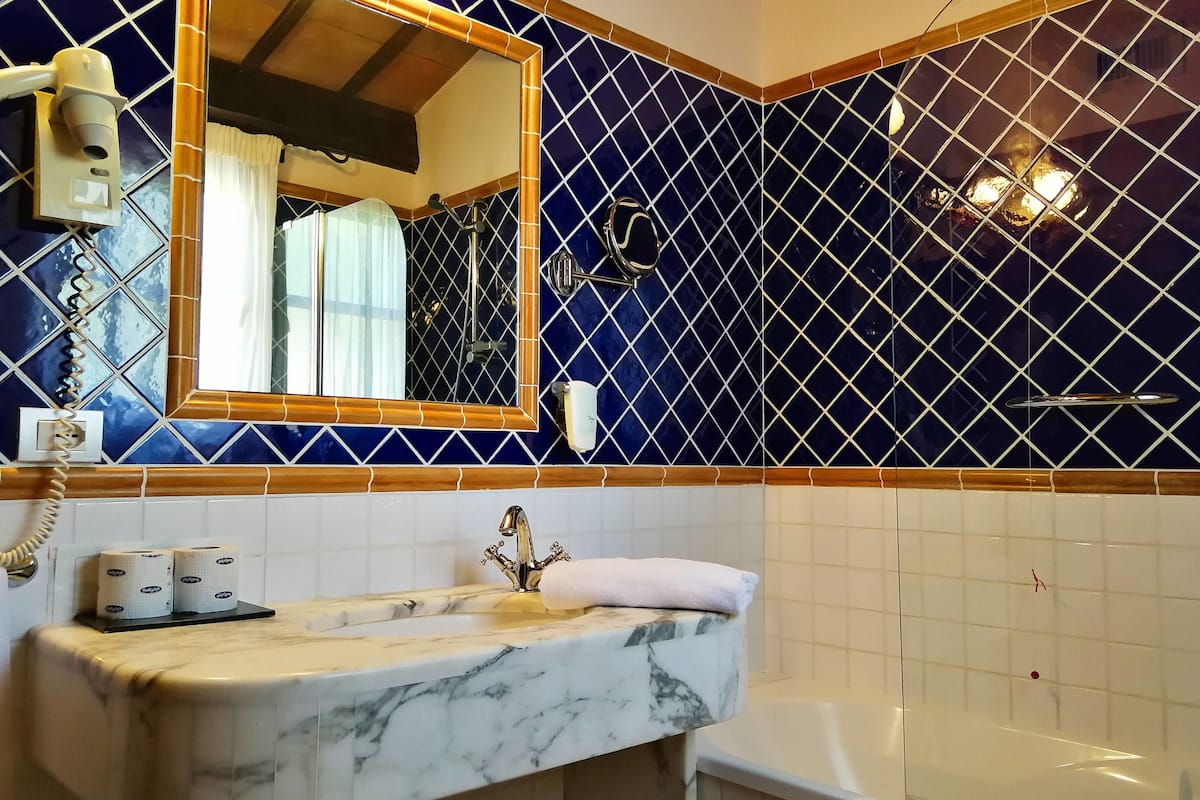 triple room | bathroom | shower, hair dryer, bidet, towels