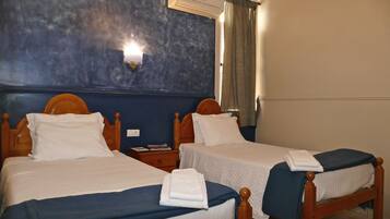 Standard Twin Room | Egyptian cotton sheets, pillowtop beds, iron/ironing board, free WiFi