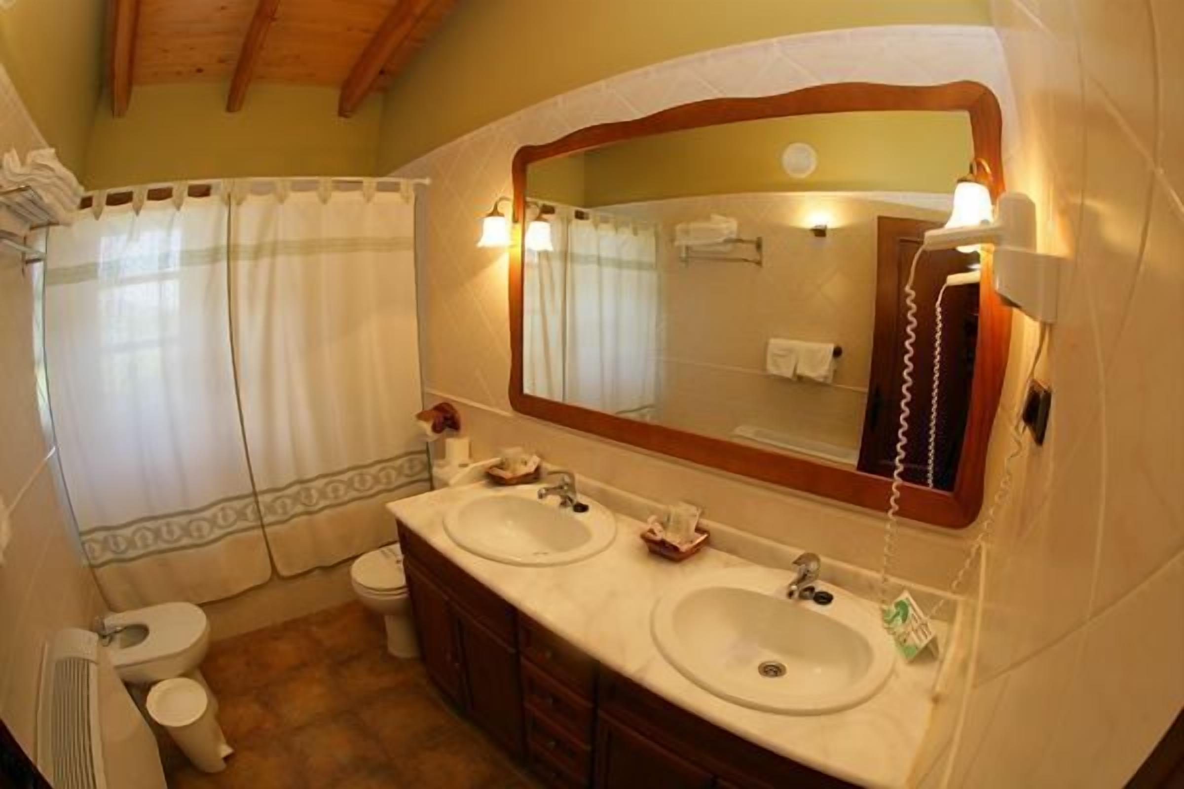 combined shower/bathtub, deep-soaking bathtub, hair dryer, towels