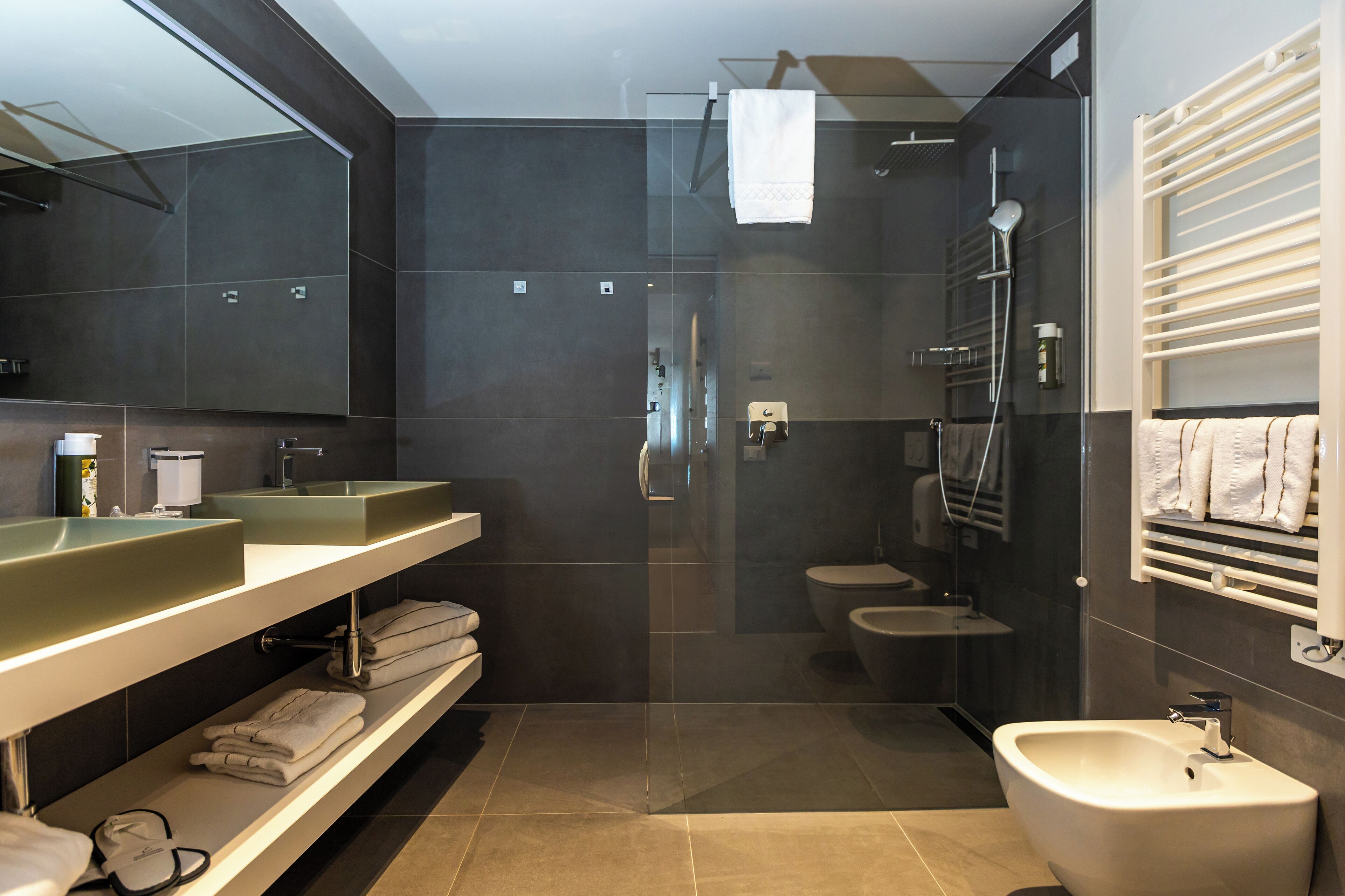 studio suite | bathroom | shower, free toiletries, hair dryer, bathrobes