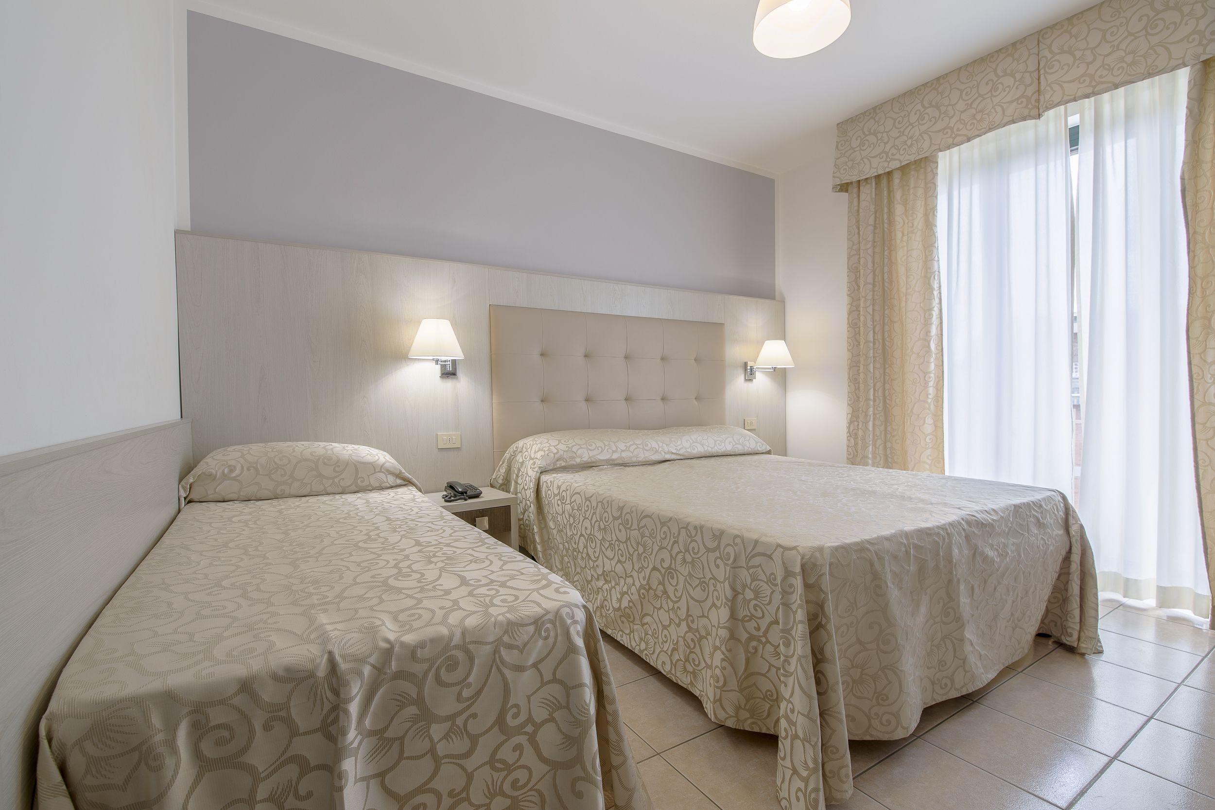 triple room, terrace | in-room safe, blackout curtains, free wifi, bed sheets