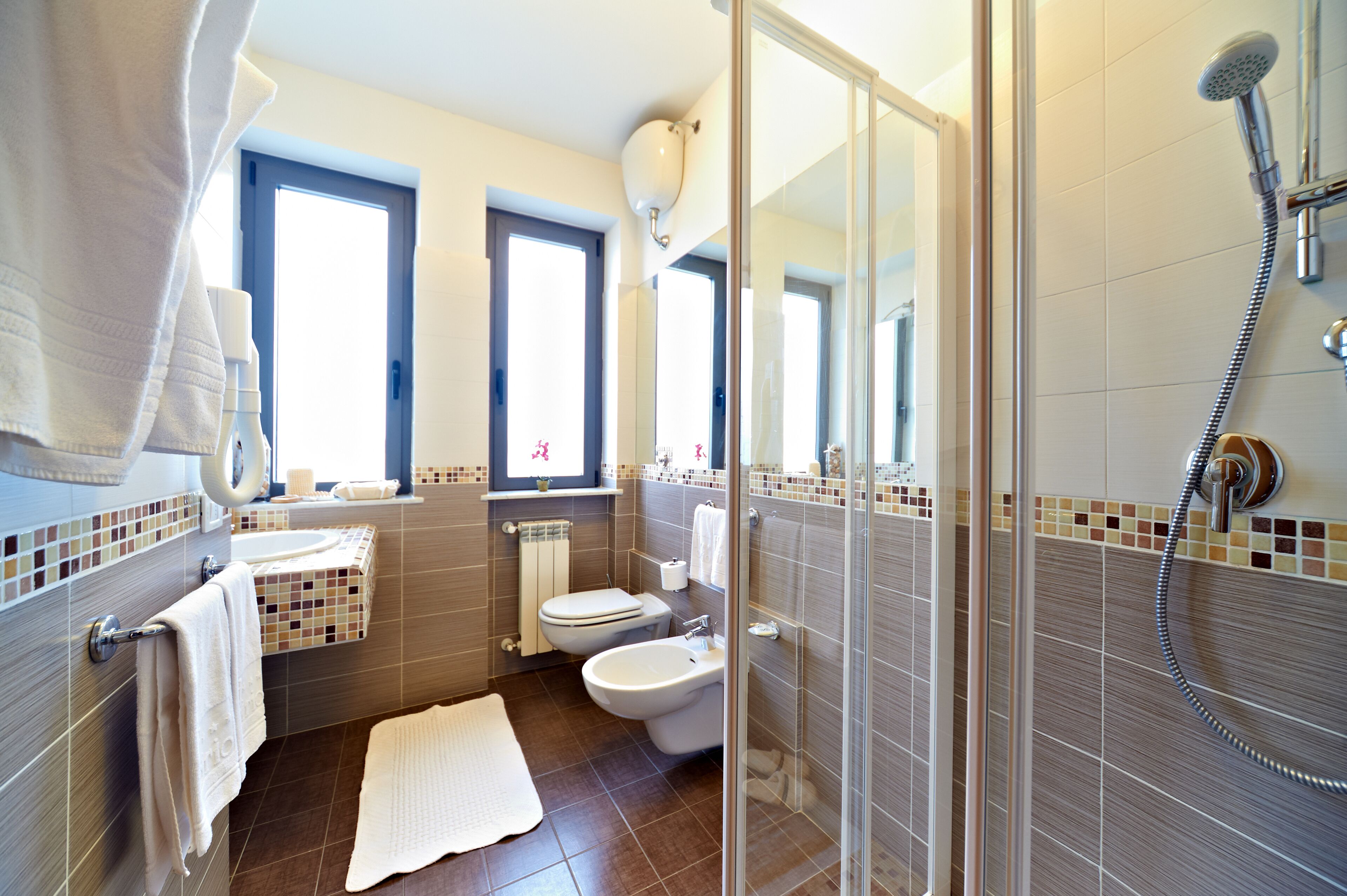 shower, free toiletries, hair dryer, bidet