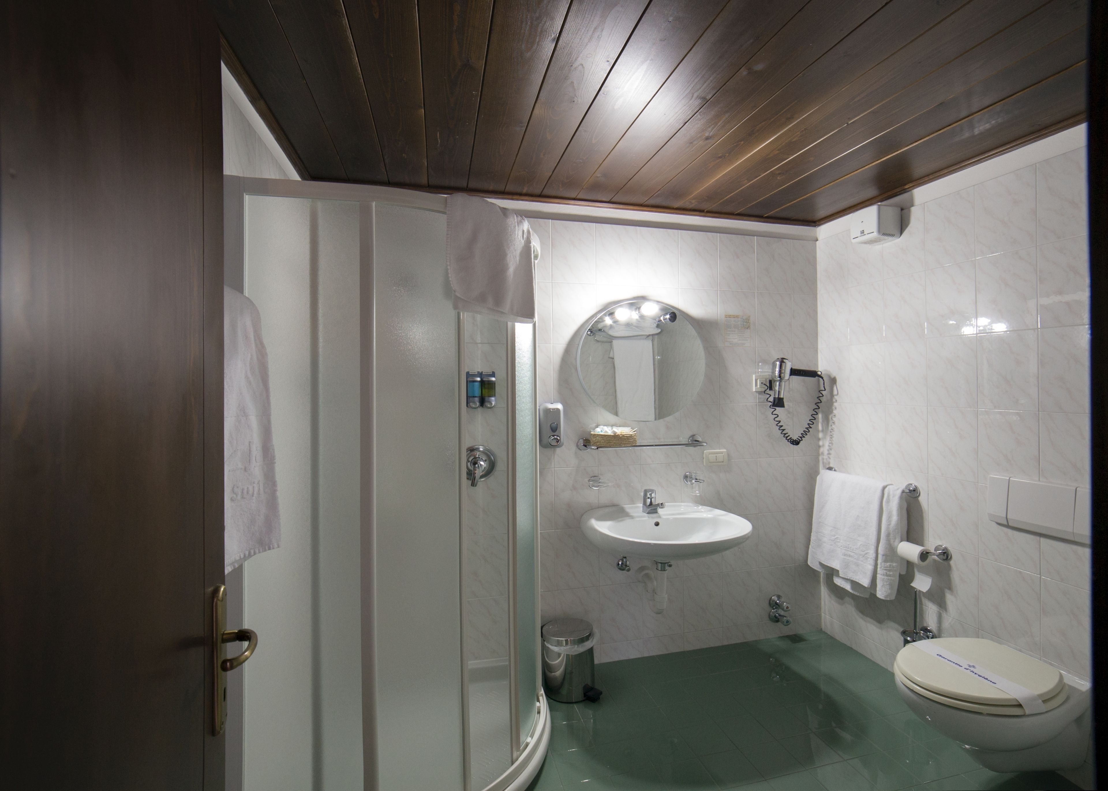 hair dryer, bathrobes, slippers, bidet