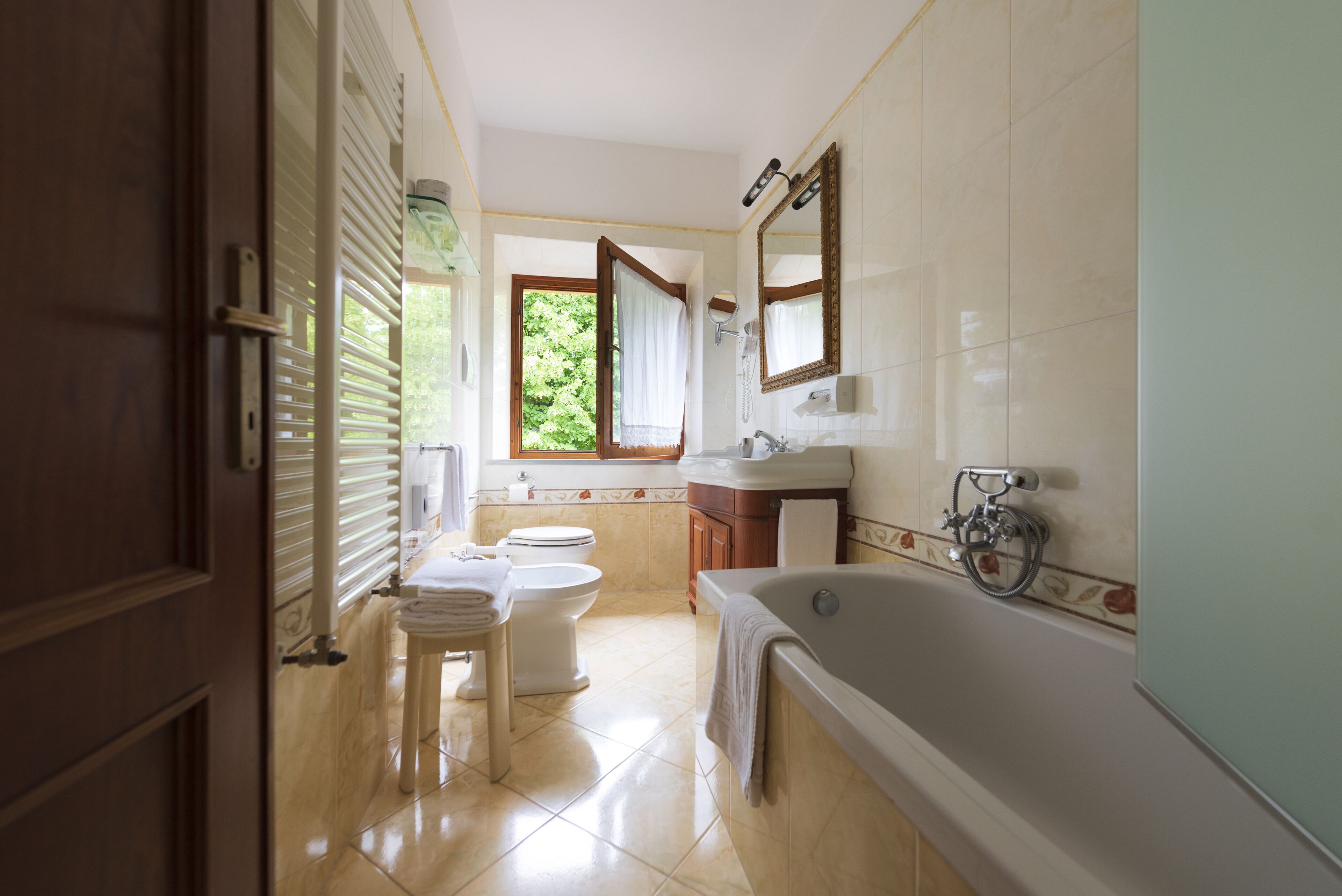 suite | bathroom | free toiletries, hair dryer, slippers, bidet