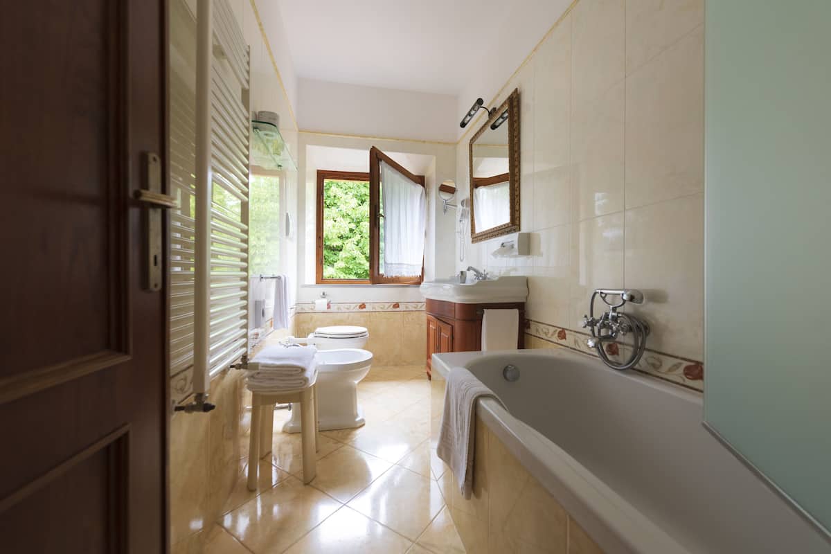 suite | bathroom | free toiletries, hair dryer, slippers, bidet