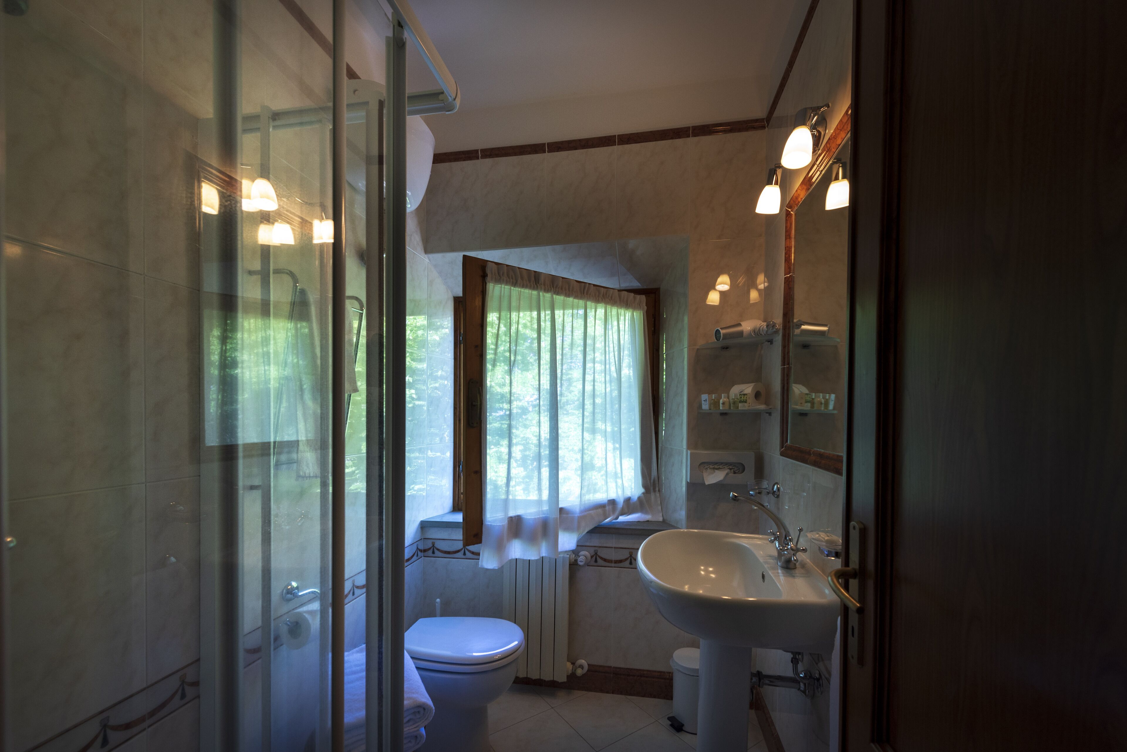 suite | bathroom | free toiletries, hair dryer, slippers, bidet