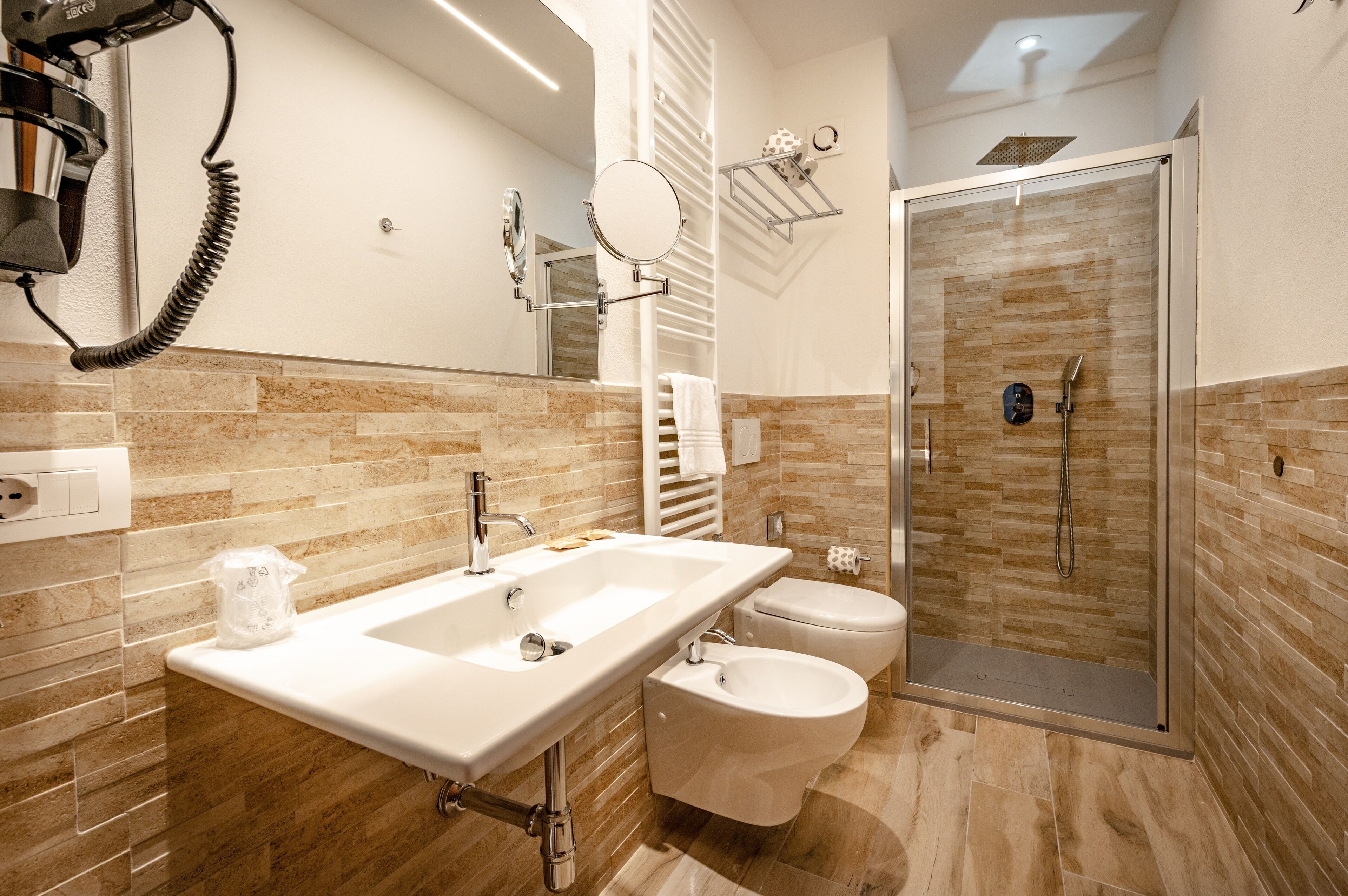 quadruple room | bathroom | shower, rainfall showerhead, free toiletries, hair dryer