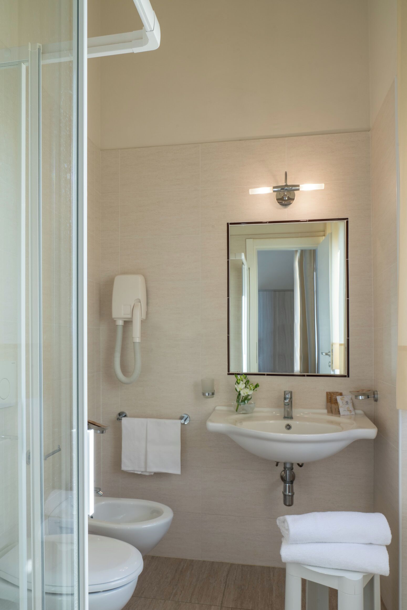 shower, free toiletries, hair dryer, bidet