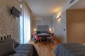 Habitació quàdruple superior | Llençols italians de la marca Frette i cobrellits