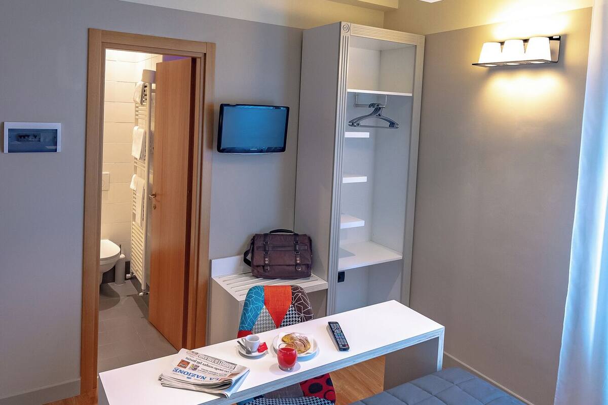 superior double room single use | frette italian sheets, down duvets, select comfort beds, desk