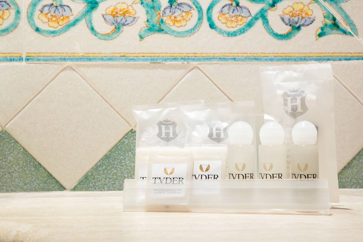 free toiletries, hair dryer, bidet, towels