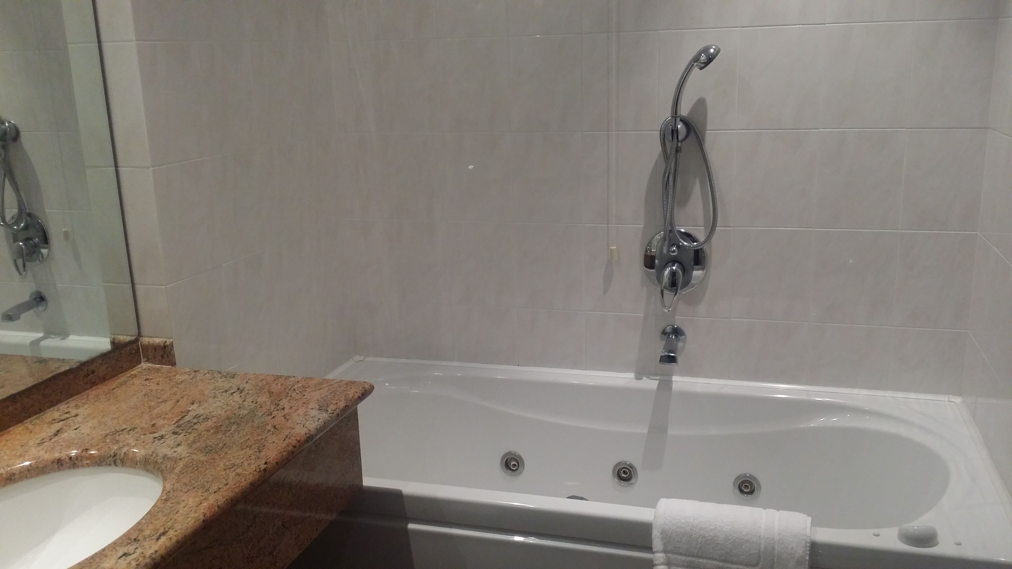 rainfall showerhead, hair dryer, soap, shampoo