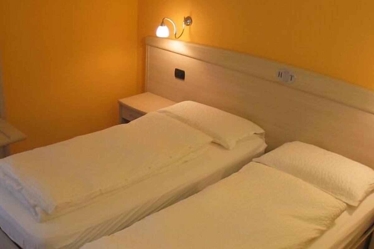 quadruple room | premium bedding, down duvets, in-room safe, desk