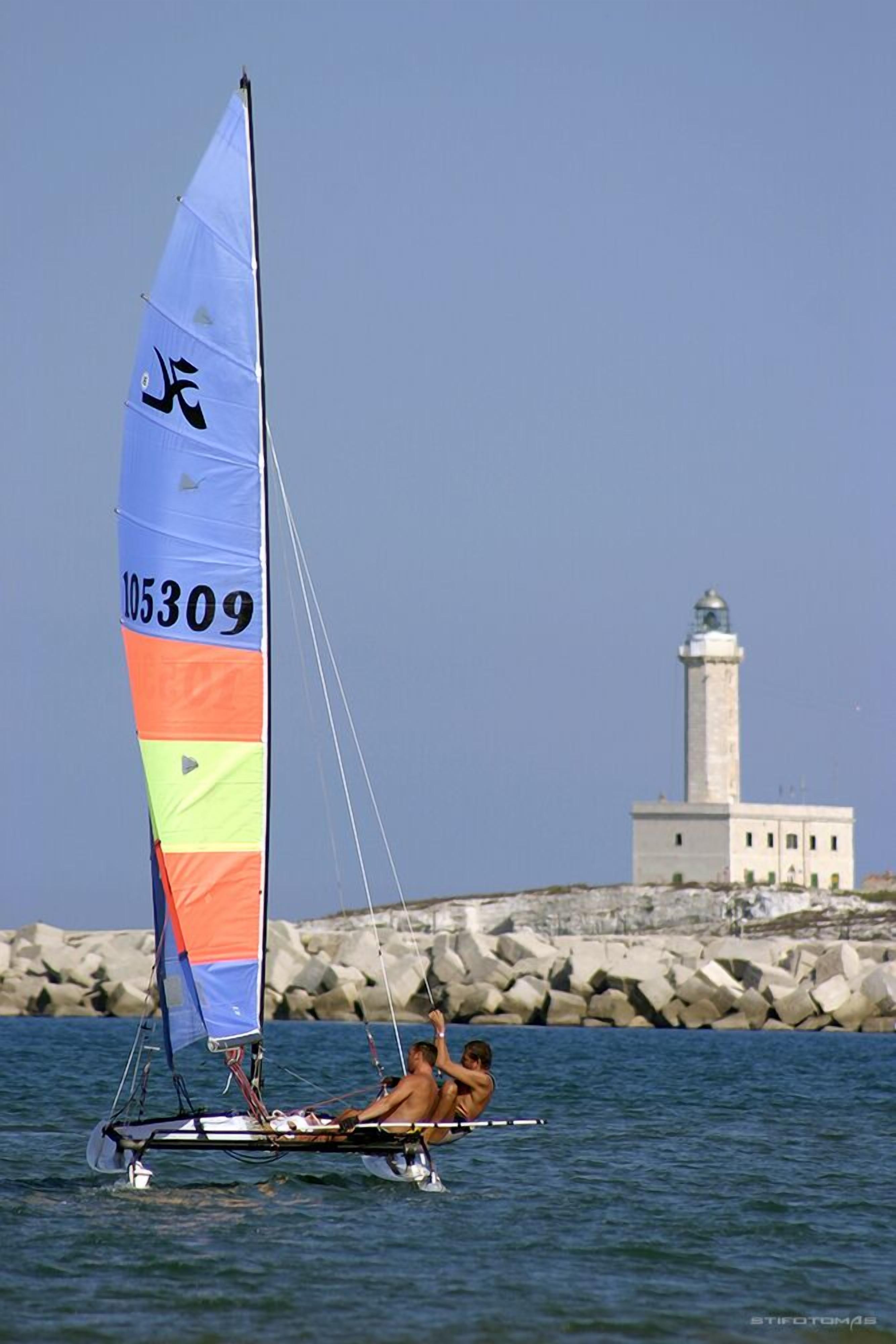 private beach, sun-loungers, beach umbrellas, beach volleyball