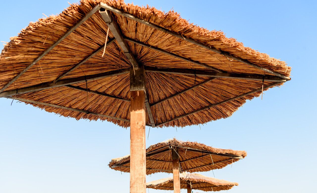 private beach, sun-loungers, beach umbrellas, beach volleyball