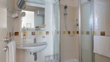Shower, free toiletries, hair dryer, towels