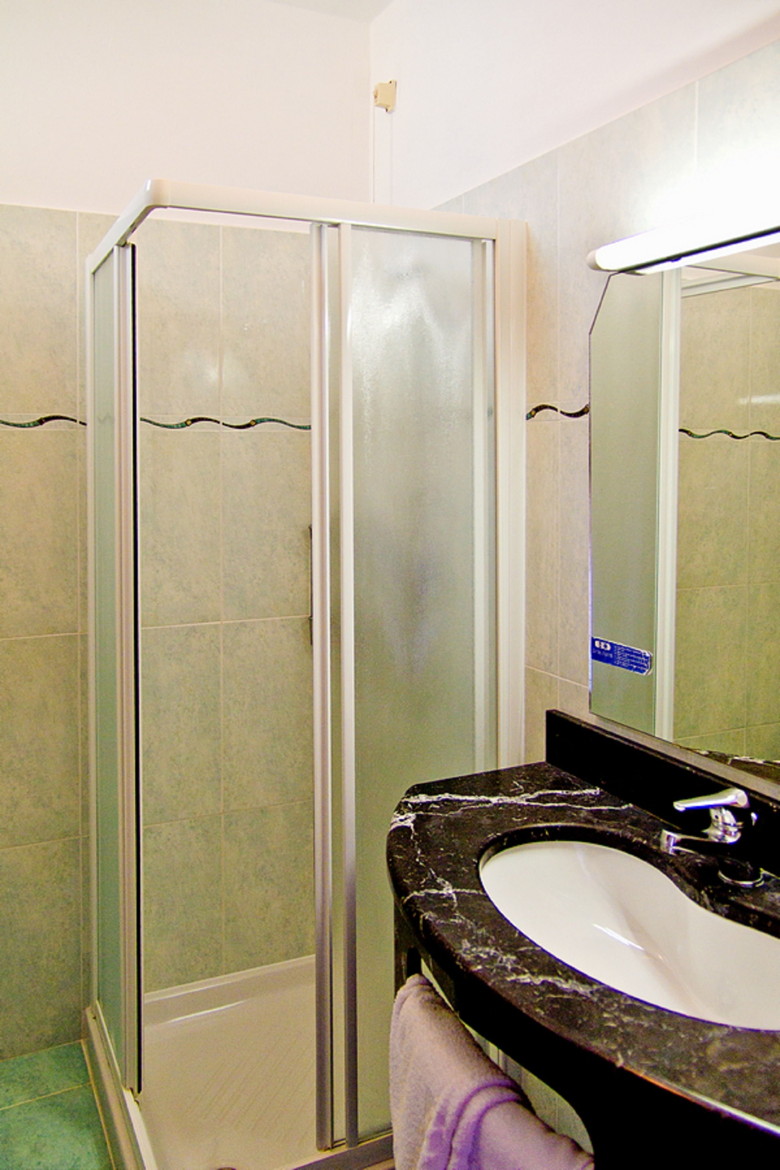 standard quadruple room, private bathroom, ocean view | bathroom | shower, free toiletries, hair dryer, dressing gowns