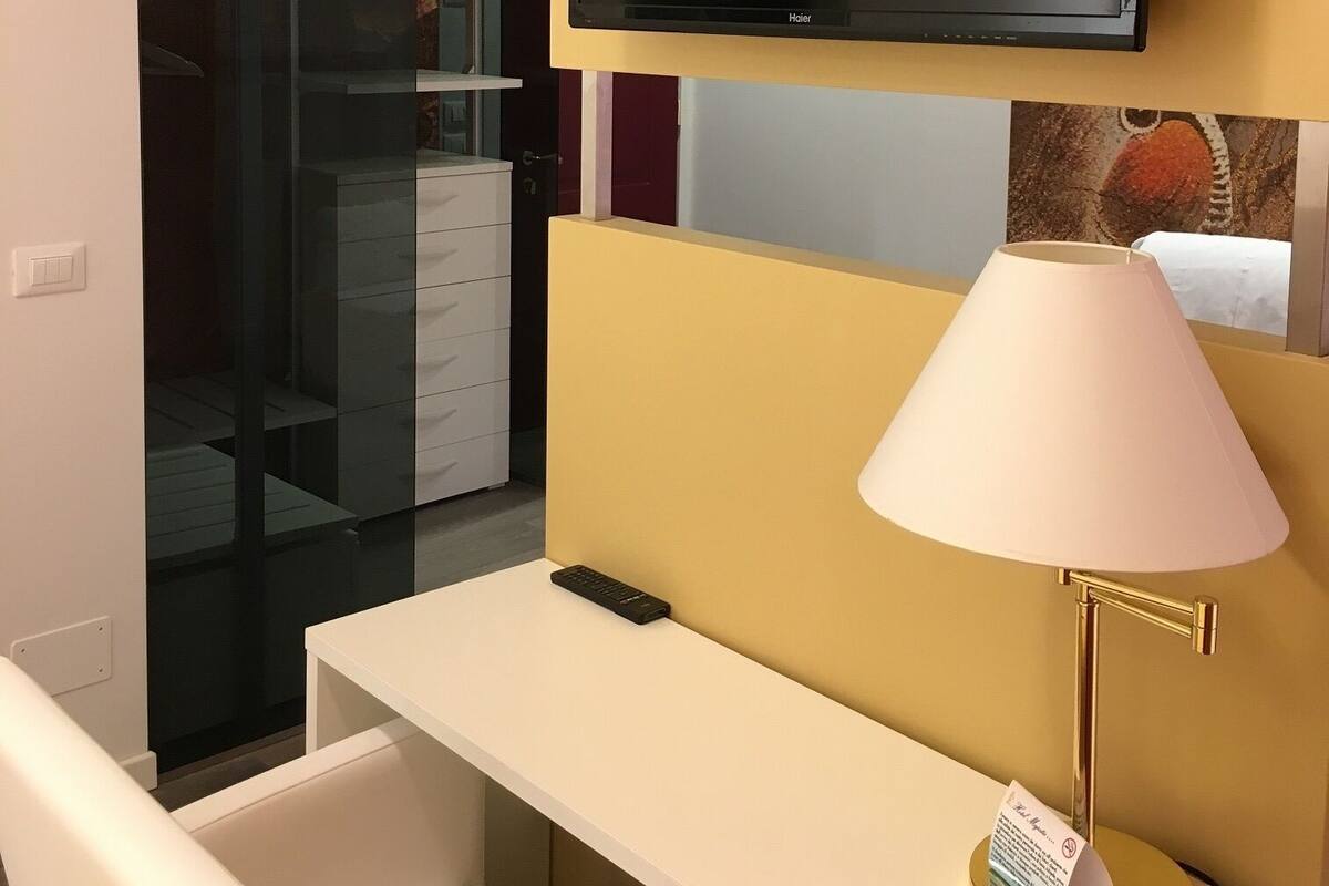 Superior Double or Twin Room, Partial Sea View | Minibar, in-room safe, desk, soundproofing